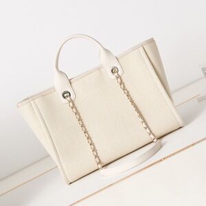 CHANEL Cream Canvas Tote with Chain-Trim Handles